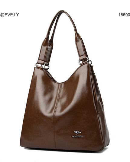 اعْتِماد | حقيبة يد وكتف جلد