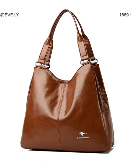 اعْتِماد | حقيبة يد وكتف جلد